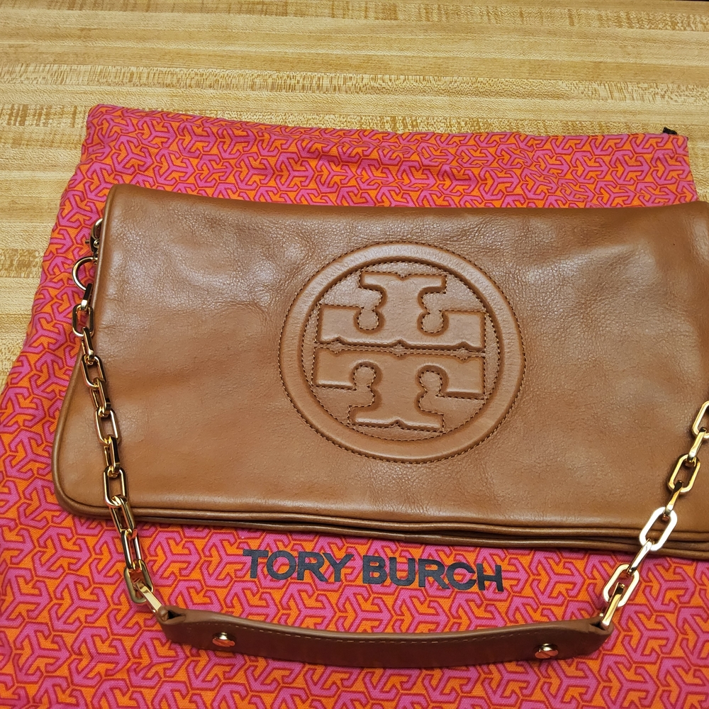 Tory Burch Brown Clutch with Gold Chain Strap and Embossed Logo